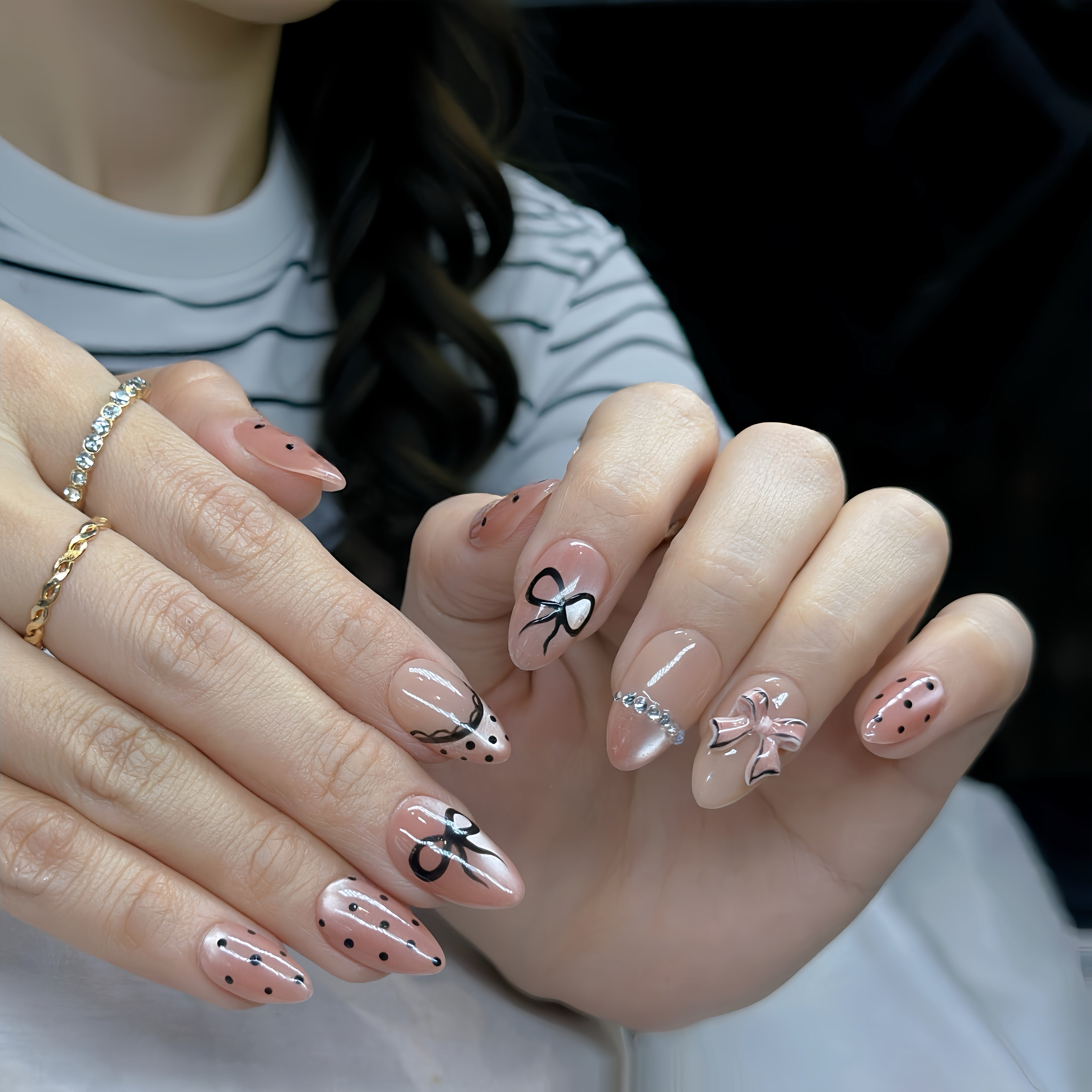 Pink Bow Mobster – Short Almond Press On Nails 🎀✨ | Nude Pink, Black Bow Art & Rhinestone Detail | Hand-Painted Gel Reusable Set, 30 Nails, 15 Sizes, Perfect Gift