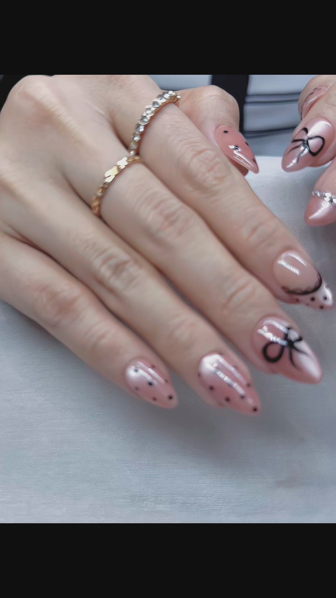Pink Bow Mobster – Short Almond Press On Nails 🎀✨ | Nude Pink, Black Bow Art & Rhinestone Detail | Hand-Painted Gel Reusable Set, 30 Nails, 15 Sizes, Perfect Gift